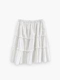 Falda midi blanca de bordado inglés con tres capas escalonadas y volantes fruncidos