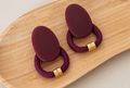 Aretes Borgoña — Trenzados con detalle dorado